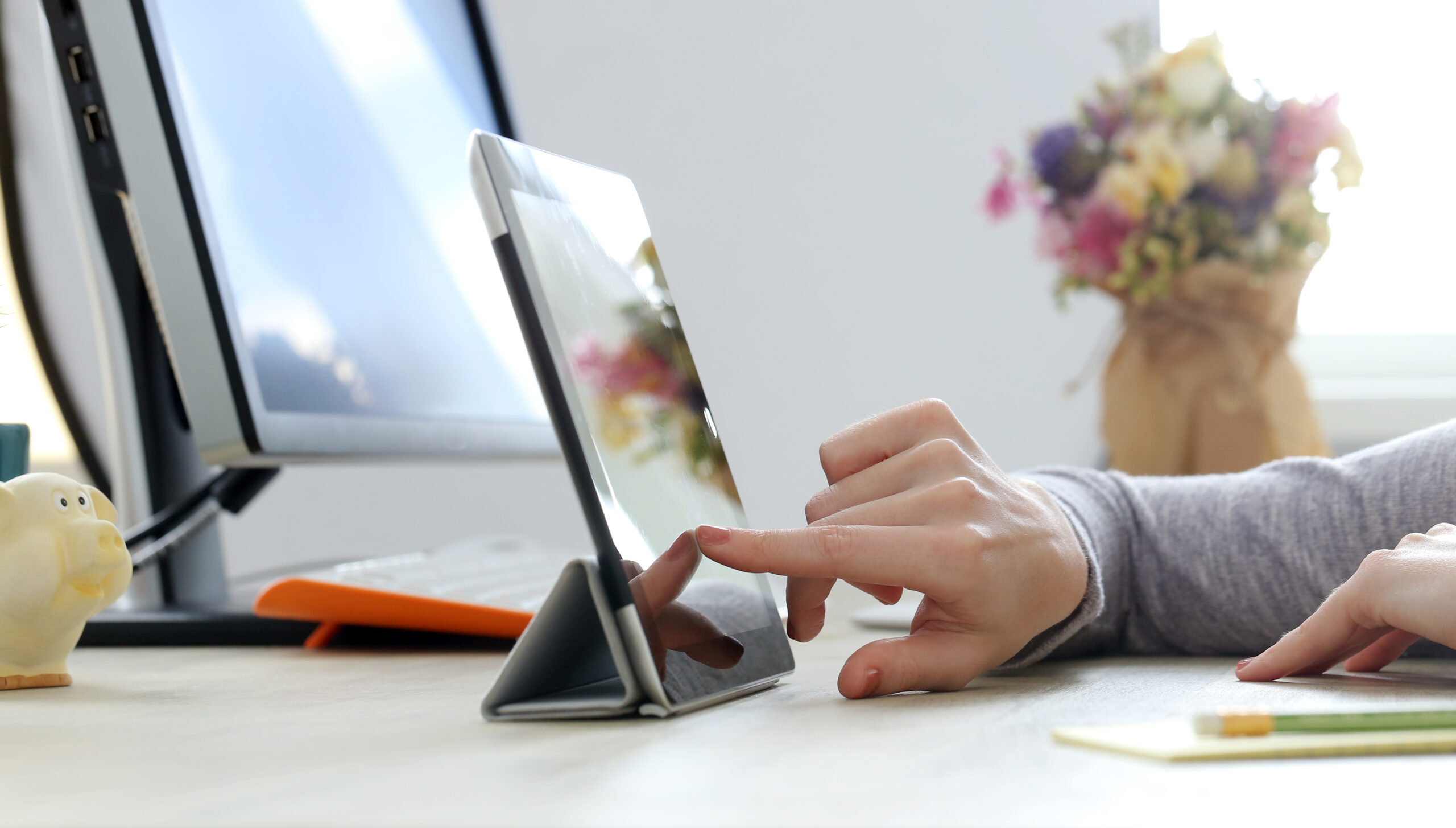 House. Girl with ipad on the table